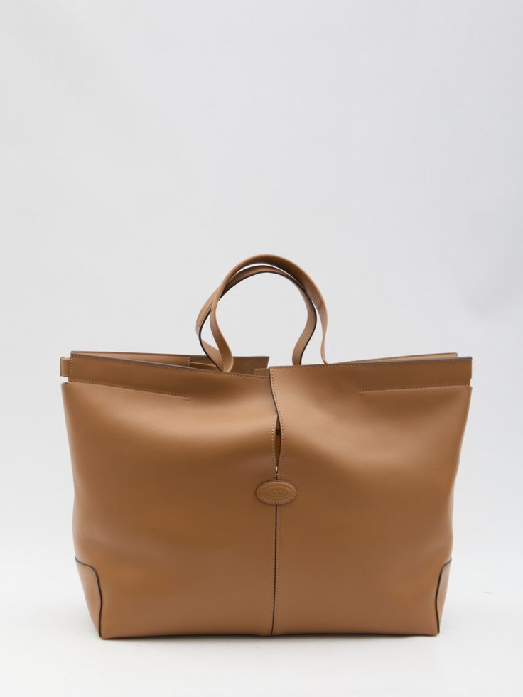 100% Calf leather Designer Tan Bag With Handle Drop, Designer Tan Bag, Designer Tan Bags With Leather Handles, Brown Calf Leather Bag With Handles, Calf Leather Bag With Detachable Handle And Top Handle, Calf Leather Bag With Detachable Top Handle, Cognac Bag With Detachable Handle In Calf Leather, Cognac Calf Leather Bag With Detachable Handle, Luxury Cognac Calf Leather Bag With Detachable Handle