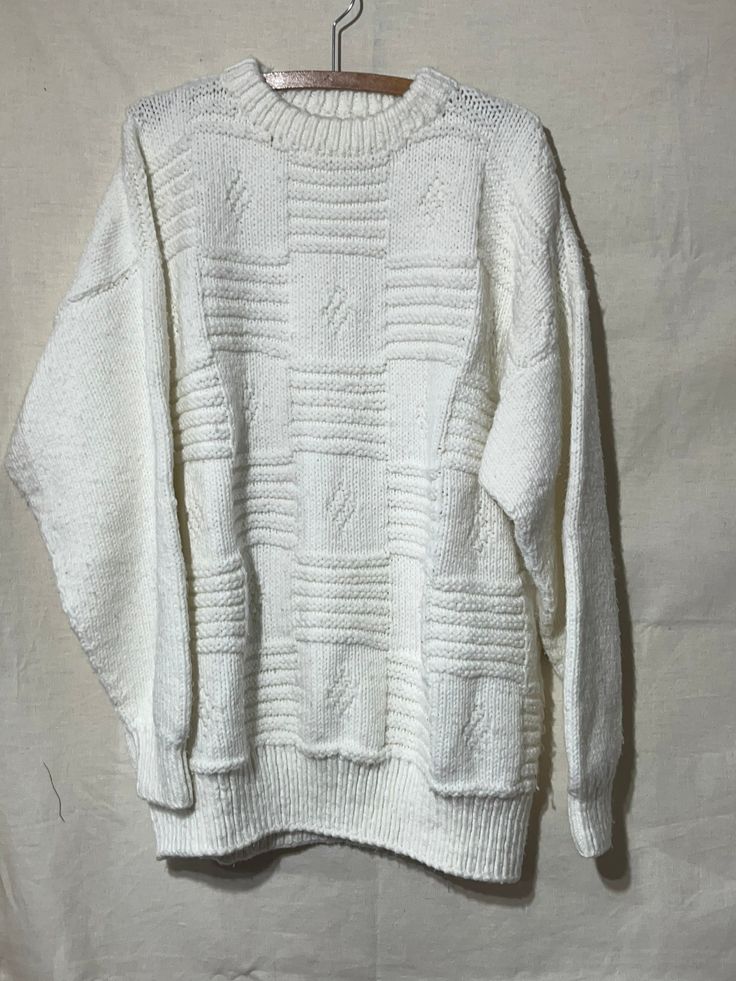 Keep warm!  Beautiful hand knit chunky knit sweater in white. Has parkay look and fits size L. 100% acrylic wool White Knitted Sweater For Fall, White Knitted Acrylic Sweater, White Chunky Knit Long Sleeve Sweater, Oversized White Acrylic Sweater, White Acrylic Sweater For Winter, Cozy White Cable Knit Sweater, White Knitted Long Sleeve Sweater, White Hand-knitted Acrylic Sweater, White Cable Knit Sweater For Fall