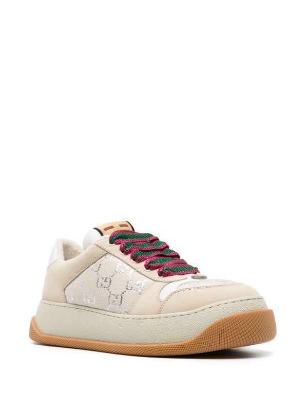 Gucci Screener GG-lamé Sneakers - Farfetch Beige Embroidered Logo Sneakers For Streetwear, Beige Sneakers With Embroidered Logo For Streetwear, Designer High-top Lace-up Sneakers With Embroidered Logo, Beige Leather Sneakers With Embroidered Logo, Designer Lace-up High-top Sneakers With Embroidered Logo, Designer Beige Sneakers With Rubber Sole, Designer High-top Sneakers With Embroidered Logo, Designer Beige Sneakers With Contrast Sole, Designer Low-top Cream Sneakers