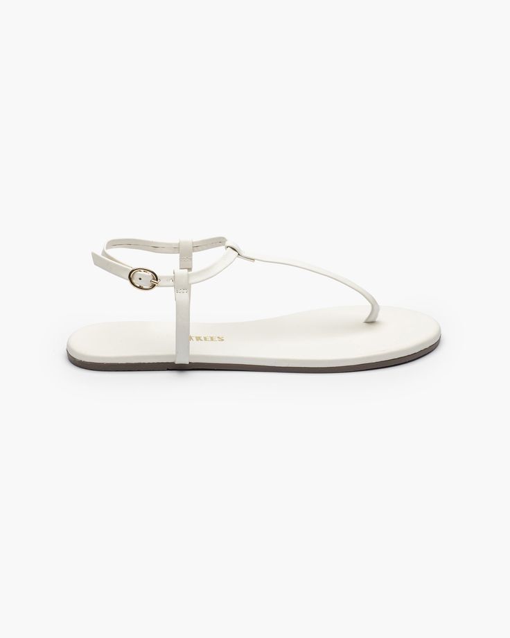 True minimalist form.Classic T-strap silhouette with a minimal ankle band and buckle. Hand made in Brazil with our premium soft leather, and cushioned insole so you can skip the break-in period. Classic T-strap Sandals, Classic T-strap Sandals With Ankle Strap, Elegant Flat Heel Everyday Sandals, Elegant Flat Heel Sandals For Everyday, Elegant T-strap Sandals With Adjustable Ankle Strap, Elegant T-strap Sandals With Adjustable Single Toe Strap, Elegant Leather Sandals For Everyday, Classic T-strap Sandals With Removable Insole, Classic T-strap Sandals With Buckle Closure