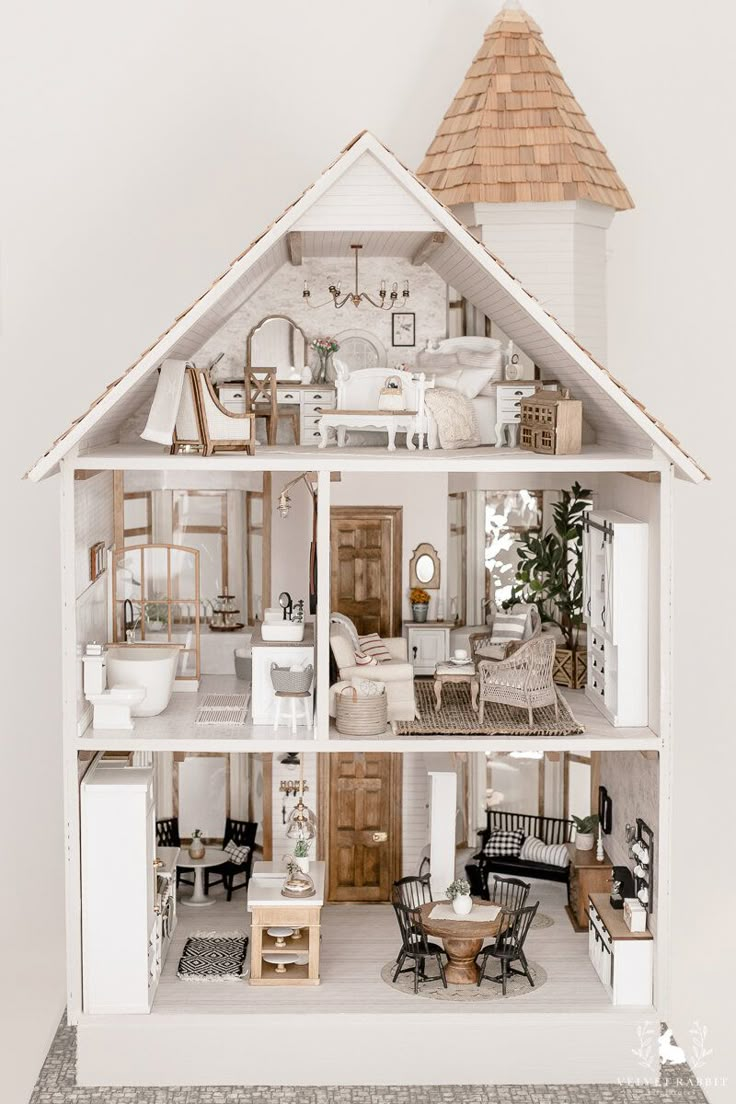 a doll house is shown with furniture and accessories