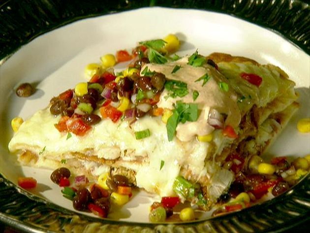 a white plate topped with food on top of a table