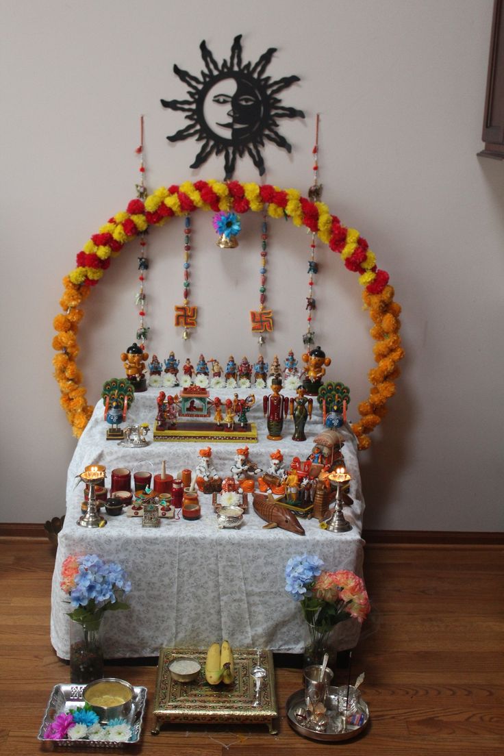 a table topped with lots of decorations and candles