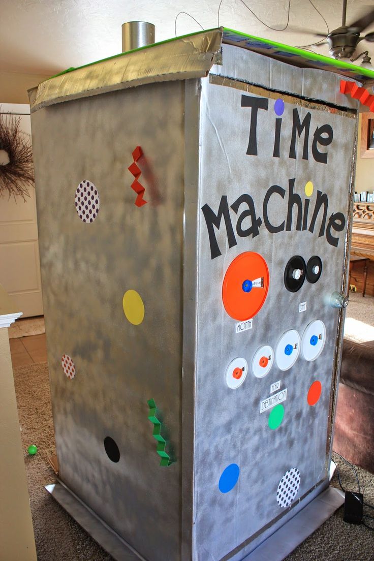 a metal box with magnets on it and the words time machine painted on it