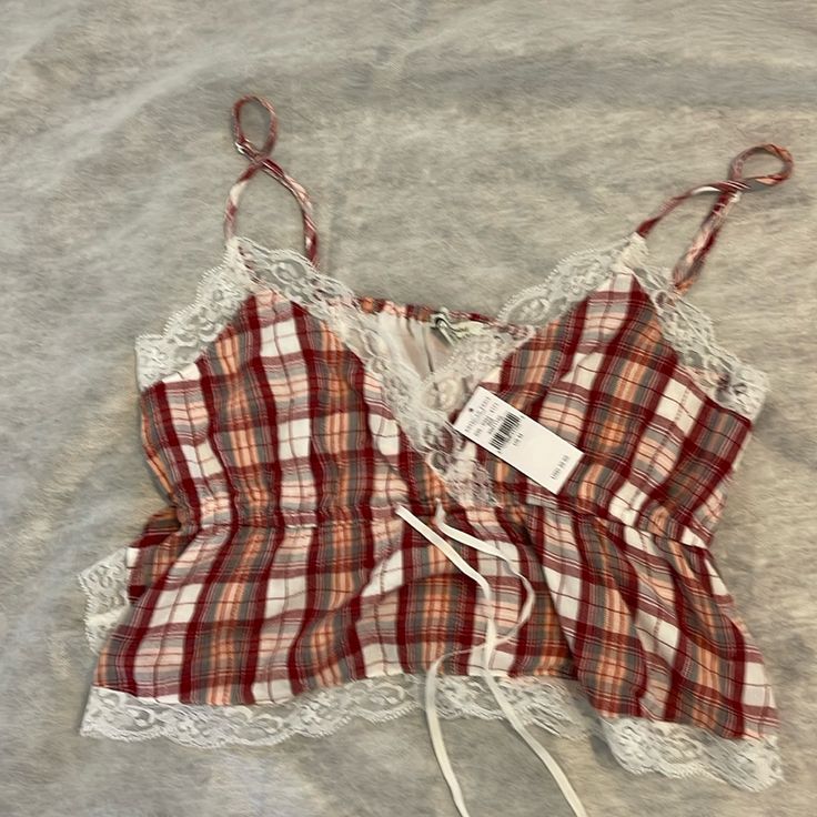 American Eagle Red And White Plaid Camisole-Style Crop Top With Spaghetti Straps And Ribbon Ties. Cute And Brand New With Tags On - Never Worn. Size M Tops With Ribbon, Red Trendy Camisole Crop Top, Summer Plaid Tank Top, Trendy Red Camisole Crop Top, Red Cotton Tops With Tank Straps, Trendy Spaghetti Strap Tops With Lace Trim, Trendy Tops With Lace Trim And Spaghetti Straps, Red Cotton Tank Camisole, Trendy Red Camisole Tank Top