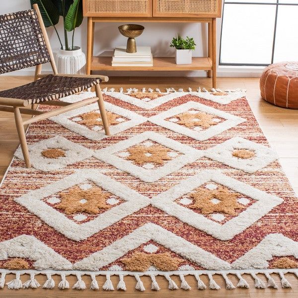 a living room area with a rug and chair