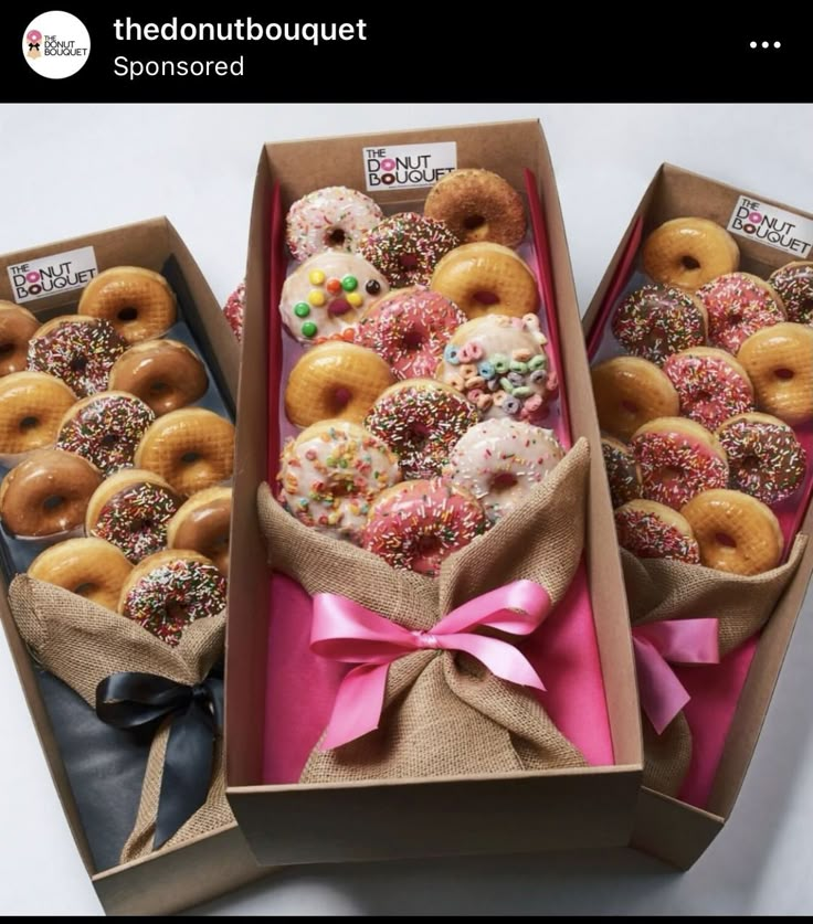 two boxes filled with different kinds of donuts