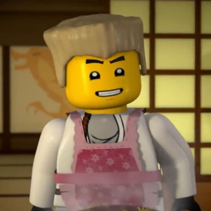 the lego movie character is holding a plate of food