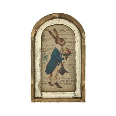 an old fashioned frame with a rabbit holding flowers in it's lap and wearing a blue coat