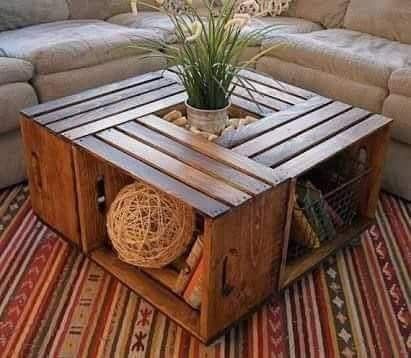 a table made out of pallet wood sitting on top of a rug