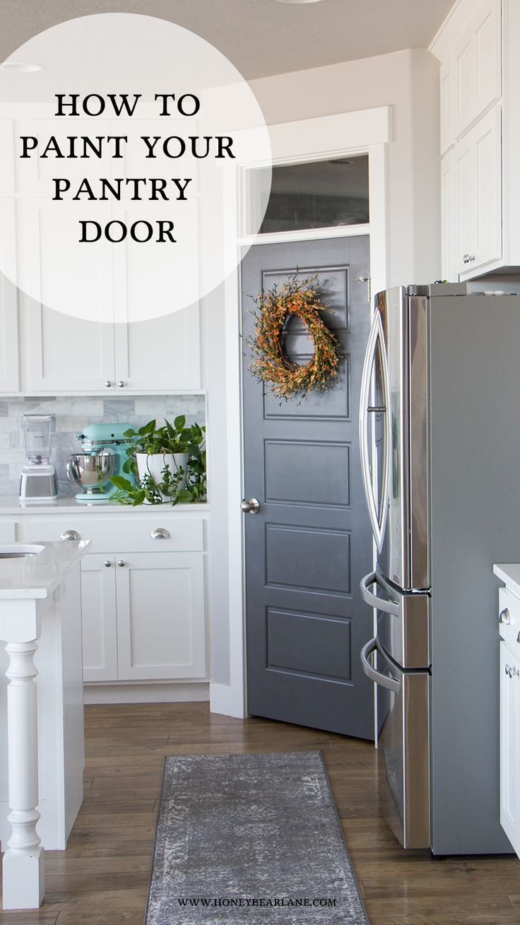 a gray door in a white kitchen with the words how to paint your pantry door