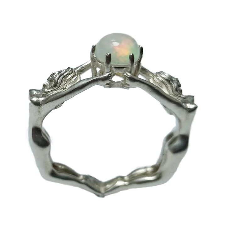 This beautiful 6mm opal is the most magical stone and set inside gorgeous women supporting the magic of this stone will get you a million compliments. I’m obsessed with real opals and though they’re pricey it’s worth it to have a unique new 2022 inspiring ring. Can make a great wedding or best friend ring to symbolize Spiritual Opal Birthstone Ring, Nature-inspired Opal Ring Gift, Spiritual Opal Ring Gift, Spiritual Opal Ring As Birthstone, Spiritual Opal Ring Birthstone, Spiritual Opal Ring For Healing, Handmade Spiritual Opal Ring For Healing, Spiritual Sterling Silver Opal Ring, Elegant Opal Ring For Healing With Natural Stones