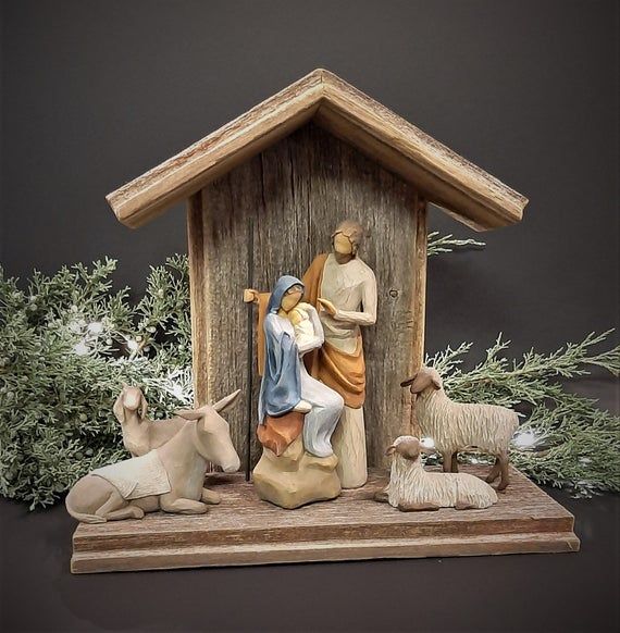 a nativity scene with figurines and decorations