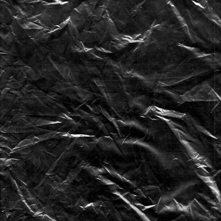 black and white photograph of wrinkled paper