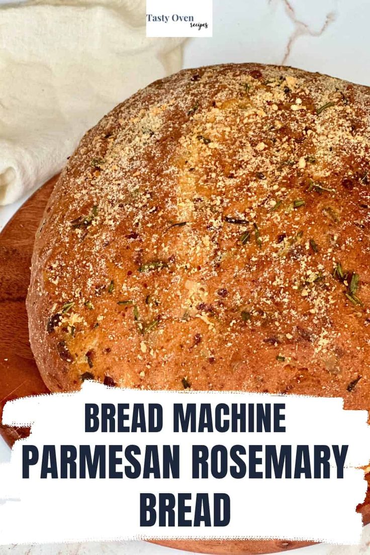 bread machine parmesan rosemary bread on a cutting board with text overlay reading bread machine parmesan rosemary bread