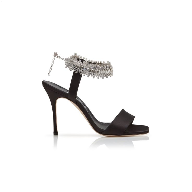 Black Satin Square Toe Sandals Featuring A Crystal Embellished Ankle Strap With An Adjustable Clasp And Stiletto High Heel. Upper: 72% Viscose, 28% Silk. Sole: 100% Cow Leather. Lining: 100% Goat Skin. Heel Measures 105 Mm. Italian Sizing. Made In Italy. This Item Runs True To Size. We Recommend Ordering Your Regular Shoe Size. Most Items Come From A Retail Store And May Have Been Tried On. They Can Occasionally Have Some Light Marks Or Stickers/Sticker Residue On The Outsoles. Color May Appear Designer Embellished Sandals For Gala, Elegant Embellished Ankle Strap Sandals, Hand Embellished Elegant Heels, Elegant Hand-embellished Heels, Designer Embellished Silver Sandals, Designer Silver Embellished Sandals, Hand Embellished Heels For Evening, Elegant Embellished Evening Sandals, Silver Embellished Sandals For Formal Occasions