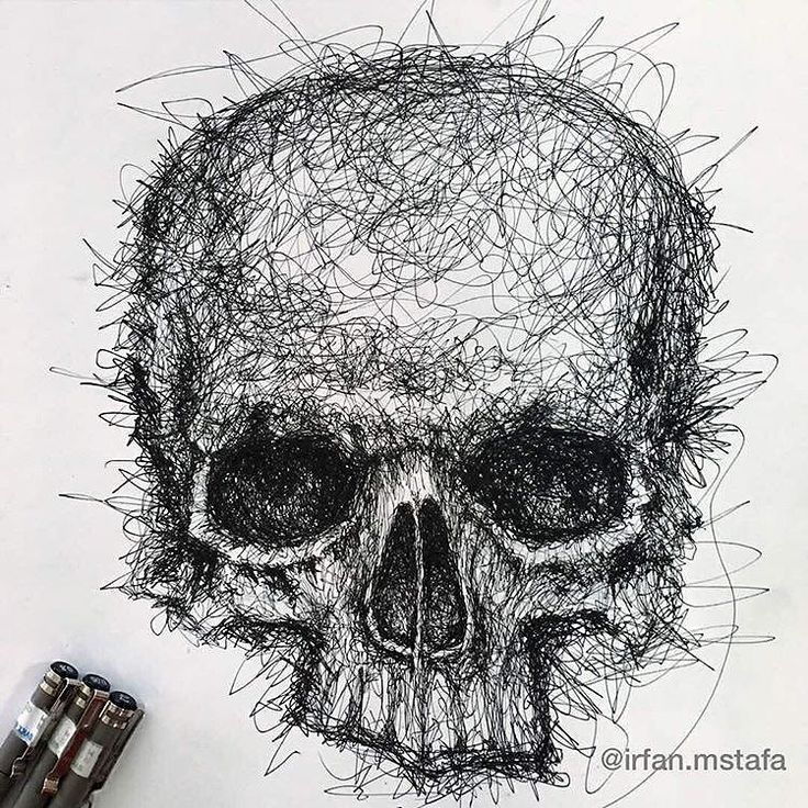 a pencil drawing of a skull on white paper