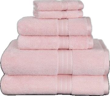 a stack of pink towels stacked on top of each other