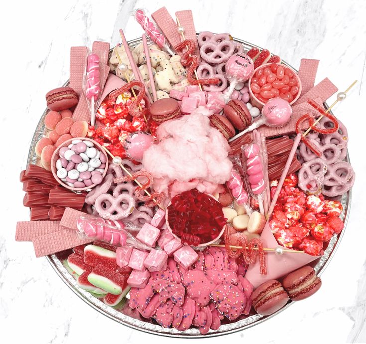 a platter filled with lots of candy and candies