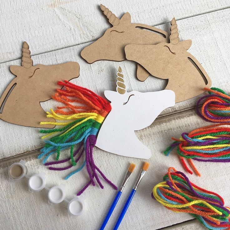 some crafting supplies are laying out on the table