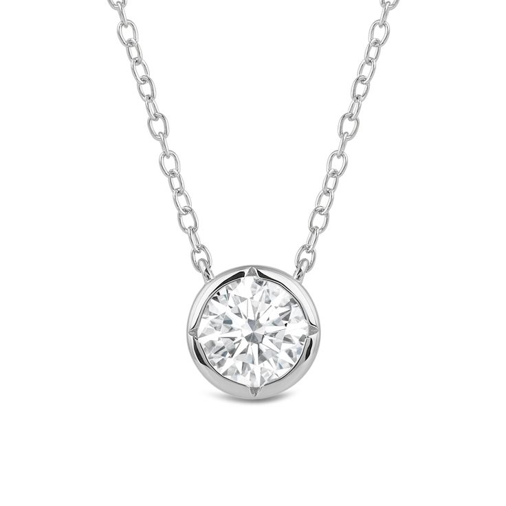 A classic bezel set solitaire Necklace with points of a kite shape chamfered on the wall completing the With Clarity signature design. Style this sparkling necklace everyday to match any look effortlessly. Timeless Sterling Silver Necklace With Bezel Setting, Fine Jewelry Solitaire Necklace With Bezel Setting, White Gold Necklace With Bezel Setting And Round Cut, Classic Diamond White Necklace With Bezel Setting, Sterling Silver Bezel Setting Round Cut Diamond Necklace, Classic Diamond Birthstone Necklace With Bezel Setting, Classic White Gold Birthstone Necklace With Bezel Setting, Timeless Solitaire Necklace In Diamond White With Bezel Setting, Timeless Solitaire Pendant Necklace With Bezel Setting