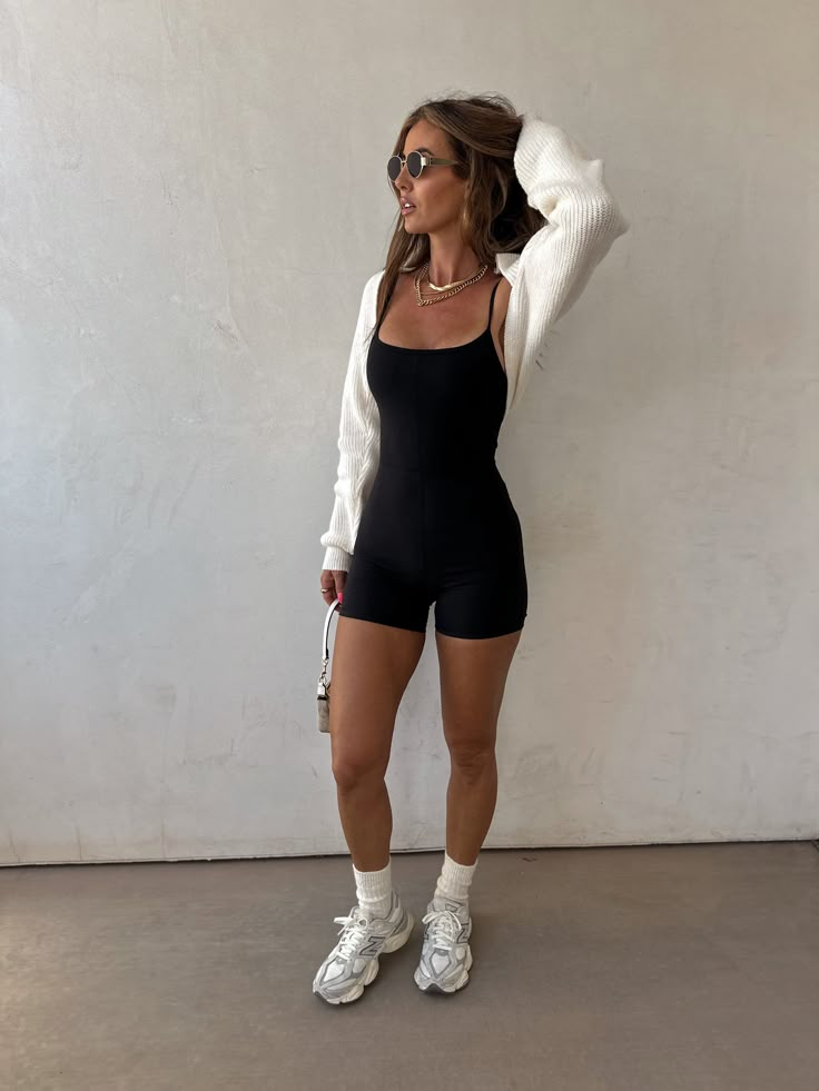 A black one piece romper in premium stretch athletic material adjustable tank straps outside seam detail down the center for added snatching Modest Athletic Outfits, Sporty Cute Outfits, Shrug Outfit, Clothes Swag, College Outfits Aesthetic, Tennessee Outfits, Knitted Shrug, Florida Fall, Cropped Outfits