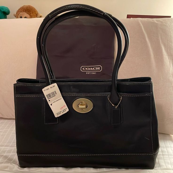 Beautiful Coach Ladies Black Leather Handbag. Purchased At Coach Outlet In Va Several Years Ago. Been Sitting In My Closet Ever Since. Classic Black Bag With Branded Hardware, Classic Satchel With Branded Hardware For Daily Use, Classic Bags With Branded Hardware For Daily Use, Classic Shoulder Bag With Branded Hardware For Everyday Use, Coach Soft Leather Shoulder Bag For Office, Classic Tote Satchel With Branded Hardware, Classic Tote Bag With Branded Hardware, Classic Office Bags With Branded Hardware, Classic Office Bag With Branded Hardware