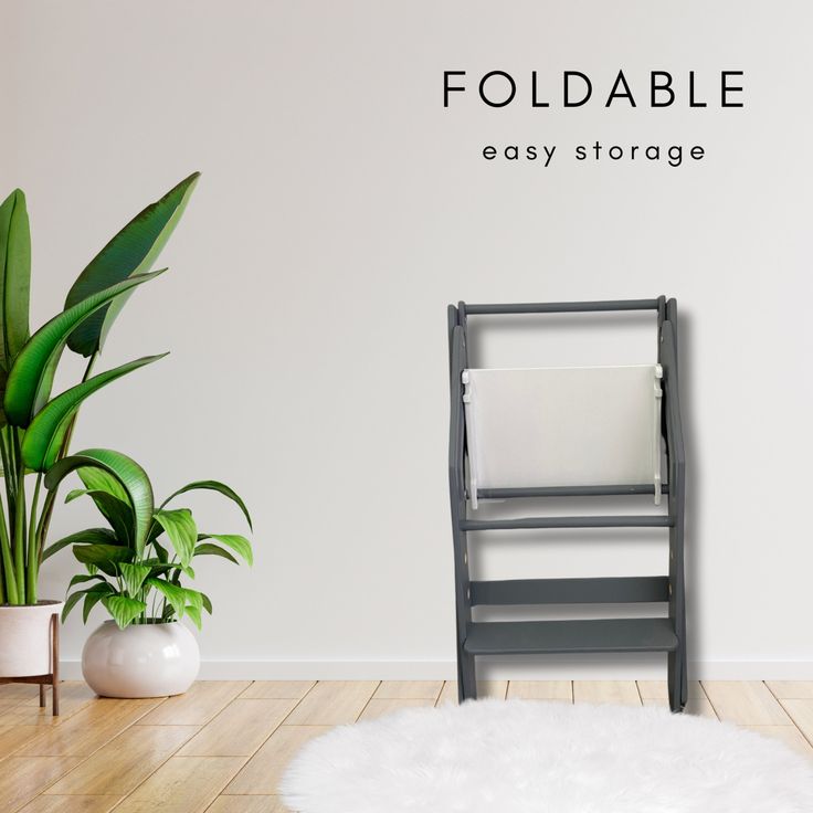 an empty chair sits in front of a white wall with the words foldable easy storage