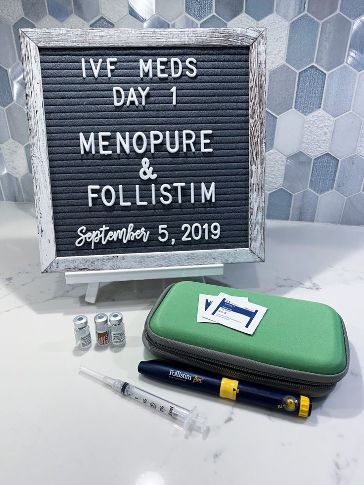 a sign that says ivf meds menopure and follisim on it