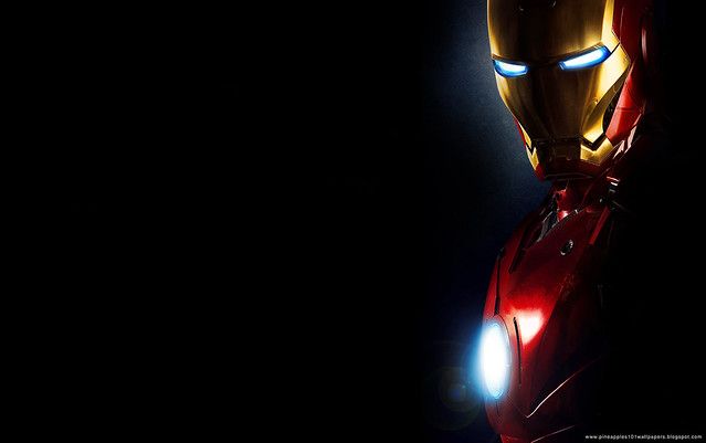 iron man in the dark with glowing eyes