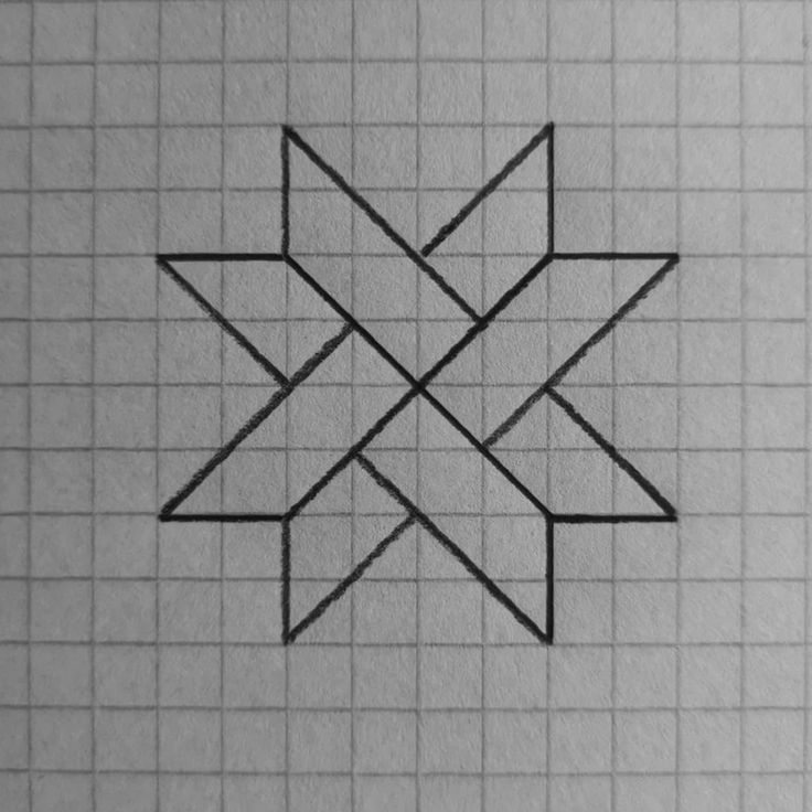 a black and white photo of a square with four intersecting lines in the shape of a star