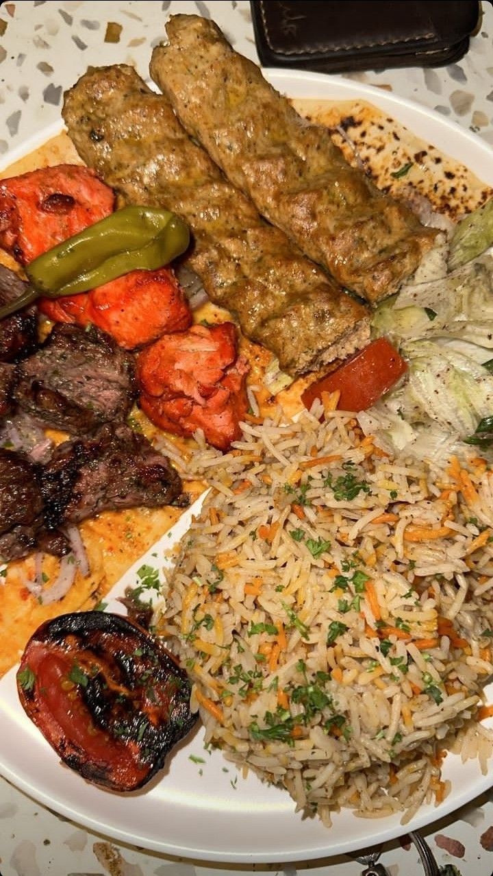 a white plate topped with different types of food