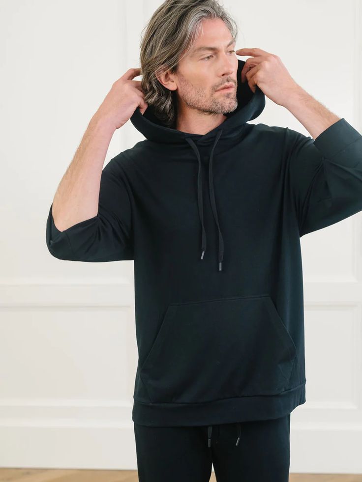 Men's Ultra-Soft Bamboo Hoodie | Cozy Earth Comfortable Solid Color Loungewear Hoodie, Modern Winter Tops For Loungewear, Modern Winter Loungewear Tops, Relaxed Fit Hoodie For Loungewear With Soft Texture, Soft Relaxed Fit Hoodie For Loungewear, Soft Textured Relaxed Fit Hoodie For Loungewear, Comfortable Stretch Hoodie For Loungewear, Cozy Stretch Solid Hoodie, Modern Tops For Winter Loungewear