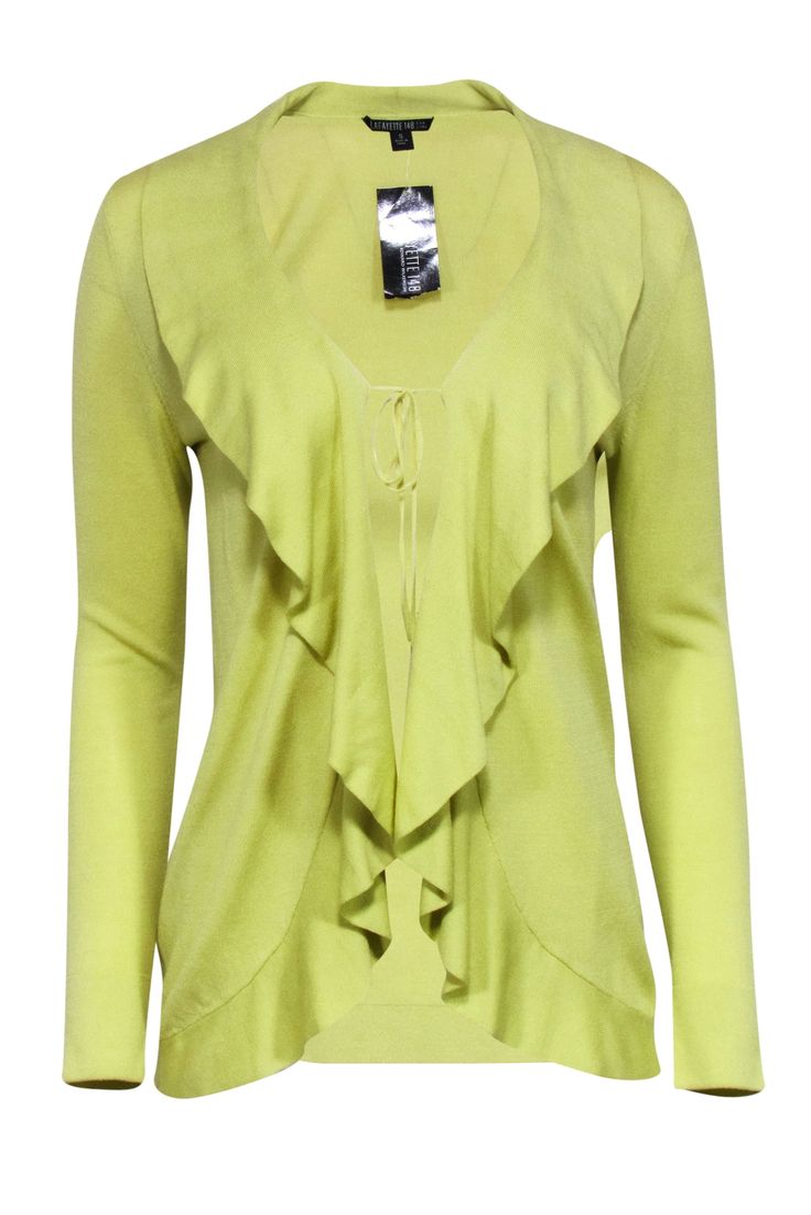 This Lafayette 148 cardigan is the perfect pick-me-up for your wardrobe! Its fun chartreuse hue and playful ruffled collar will instantly add a pop of color and cozy-cute vibes to any ensemble. With a tie-front closure, it's the ideal layer piece to take your look from basic to bold! Size S 51% Cotton, 49% Viscose Tie front Ruffled collar Bust 32.5" Waist 28" Shoulder to hem 26.5" Sleeve length 24.5" Spring V-neck Ruffled Sweater, V-neck Ruffled Cardigan For Layering, Spring Trendy Ruffled Cardigan, Trendy Ruffled Spring Cardigan, Chic Spring Cardigan With Ruffles, Chic Ruffled Spring Cardigan, Casual Long Sleeve Ruffle Cardigan, Casual Ruffled Cardigan For Fall, Spring Fitted Ruffle Cardigan