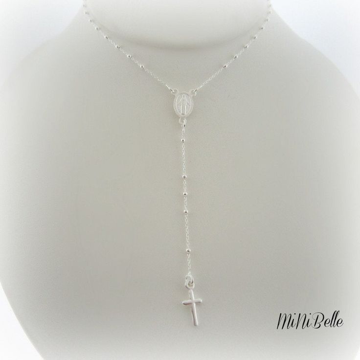 "Welcome Here I have a beautiful petite sterling silver rosary necklace. details: made with solid sterling silver .925 necklace measures 17\" inches long plus the drop measures an additional 3 1/2\". beads measure 2mm a spring ring clasp in the back Thanks for looking♥ Custom Orders Welcome♥" White Gold Sterling Silver Rosary As Gift, Sterling Silver White Gold Rosary As Gift, Dainty Silver Crucifix Necklace, Sterling Silver White Gold Necklace For First Communion, Elegant Sterling Silver Crucifix Rosary, Elegant Sterling Silver Rosary With Cross, Dainty Silver Necklace With Miraculous Medal, Dainty Silver Crucifix Jewelry, White Gold Sterling Silver Jewelry For First Communion