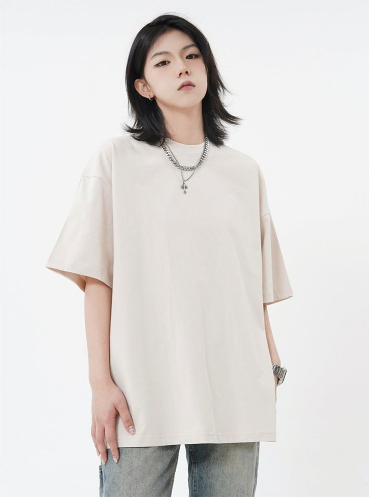 Our Oversized Plain T-Shirt is perfect for an effortless, everyday look. Its simple, casual design pairs well with any bottoms and provides a relaxed fit for maximum comfort. Whether it's a day spent lounging at home or a day out with friends, this basic tee is sure to become a wardrobe staple.
Gender: WomenMaterial: CottonClothing Length: RegularSleeve Length: Short Sleeve Style: Drop ShoulderCollar: Round Neck Basic Shirts Women Minimal Classic, Baggy Shirt Reference, Oversized Plain T Shirt, Oversized Shirts Women, Plain Oversized Shirt, Baggy Tshirt, Oversize Tshirt Outfits, Unique Clothing Style, Baggy Tee