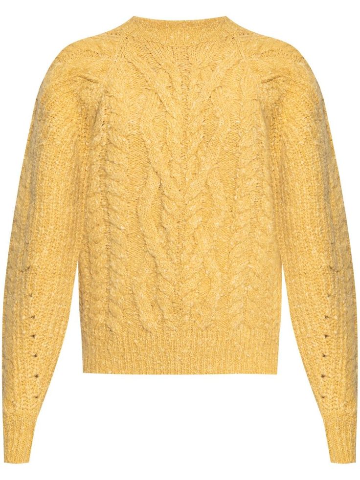 a yellow cable knit sweater on a white background