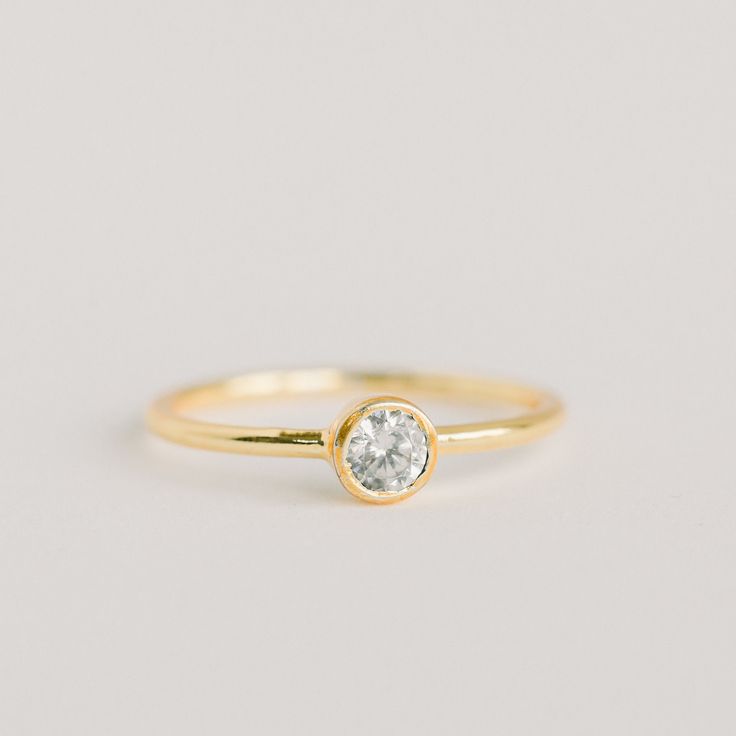 set in vermeil (sterling silver hand dipped in 24K gold) $28 #ring #elliparrjewelry #stackingring #handmade #minimalistjewelry Gold Crystal Ring With Round Band For Everyday, Modern Everyday Crystal Ring, 14k Gold Crystal Ring For Everyday, Everyday Fine Jewelry Crystal Ring With Round Band, Everyday Crystal Ring With Round Band, Everyday Diamond Ring With Vs Clarity And Round Band, 14k Gold Minimalist Crystal Ring, Everyday Cubic Zirconia Rings With Bezel Setting, Minimalist 14k Gold Crystal Ring With Round Band