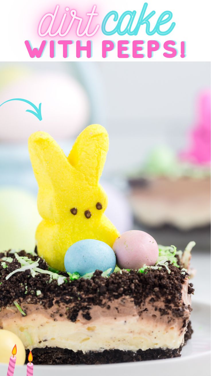 a piece of cake with chocolate frosting and peeps on top, sitting next to an egg