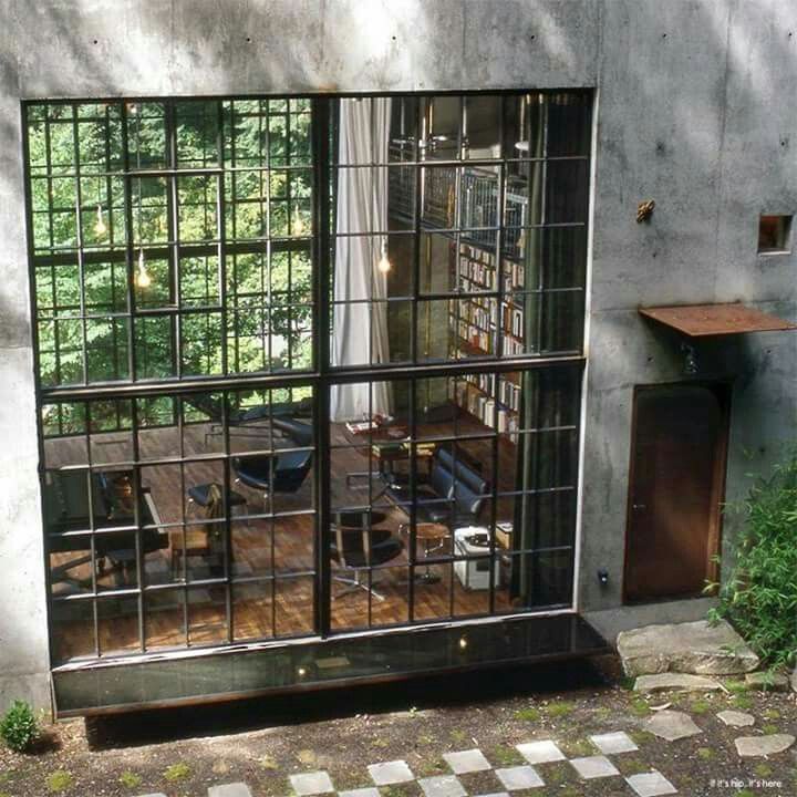 an open window shows the inside of a home office