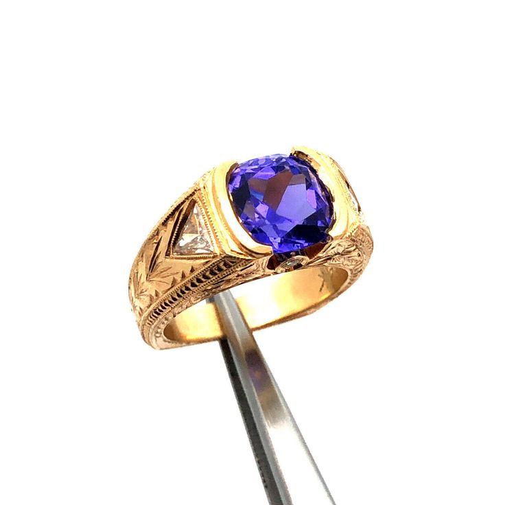 Designer 14K Yellow Gold Round Amethyst Diamond Floral Vintage Filigree Ring Ring size: 4.5  Band width: 3.3 mm  Top of ring measures: 5/16" x 7/16" Height: 1/4" Weight: 8.2 tgw 1 Round Amethyst measures approximately 8 mm  2 Trillion Diamonds measure approximately 4.5 mm x 4.5 mm each 2 Round Diamonds measure approximately 1.7 mm each Marked: 14K * DK Ring can be resized for an additional fee. Condition: As pictured. G4163 Trillion Diamonds, Ring Pictures, Filigree Ring, Floral Vintage, Ring Ring, Round Diamonds, Jewelry Watches, Jewelry Rings, Amethyst