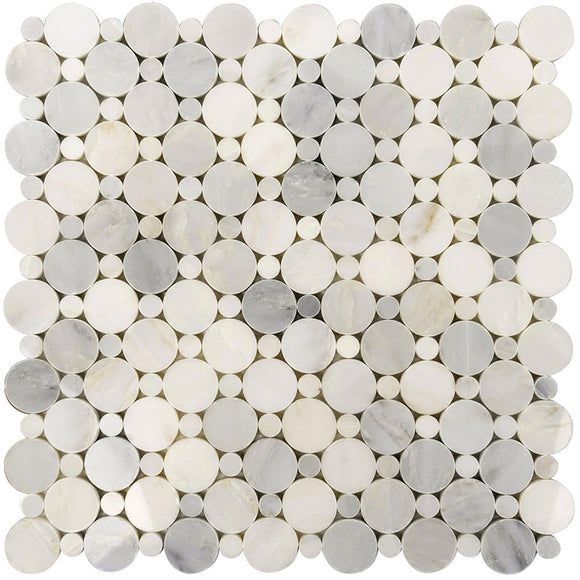 a white and grey mosaic tile with circles on the bottom, in various sizes and colors