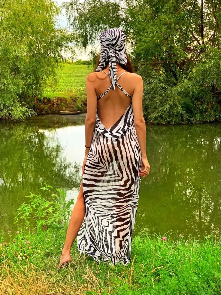 Unleash your wild side with the Women's Open Back Zebra Print Beach Dress! This stunning piece is a flawless fusion of style and comfort. The exotic zebra print is beautifully contrasted with the open back design, making it perfect for soaking up the sun on the beach. Made with quality materials, the lightweight and breathable fabric ensures absolute comfort, allowing you to move freely while still looking effortlessly chic. This stunning beach dress is perfect for any beach or poolside occasion; from sipping cocktails by the bar to taking a dip in the ocean. Let your inner animal roam free and make a statement with the Women's Open Back Zebra Print Beach Dress! Specifications Silhouette: A-LINE Season: Summer Neckline: V-Neck Decoration: Backless Style: Sexy & Club Material: Polyester Mat Beach Dress Summer, Printed Beach Dresses, Womens Dress Tops, Summer Sundress, Club Party Dresses, Plus Size Lingerie, Lingerie Sleepwear, Beach Dress, Zebra Print