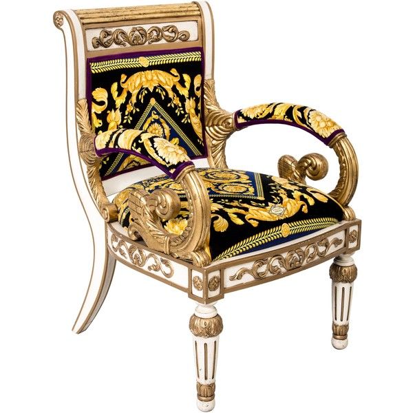 an ornately decorated chair is shown against a white background