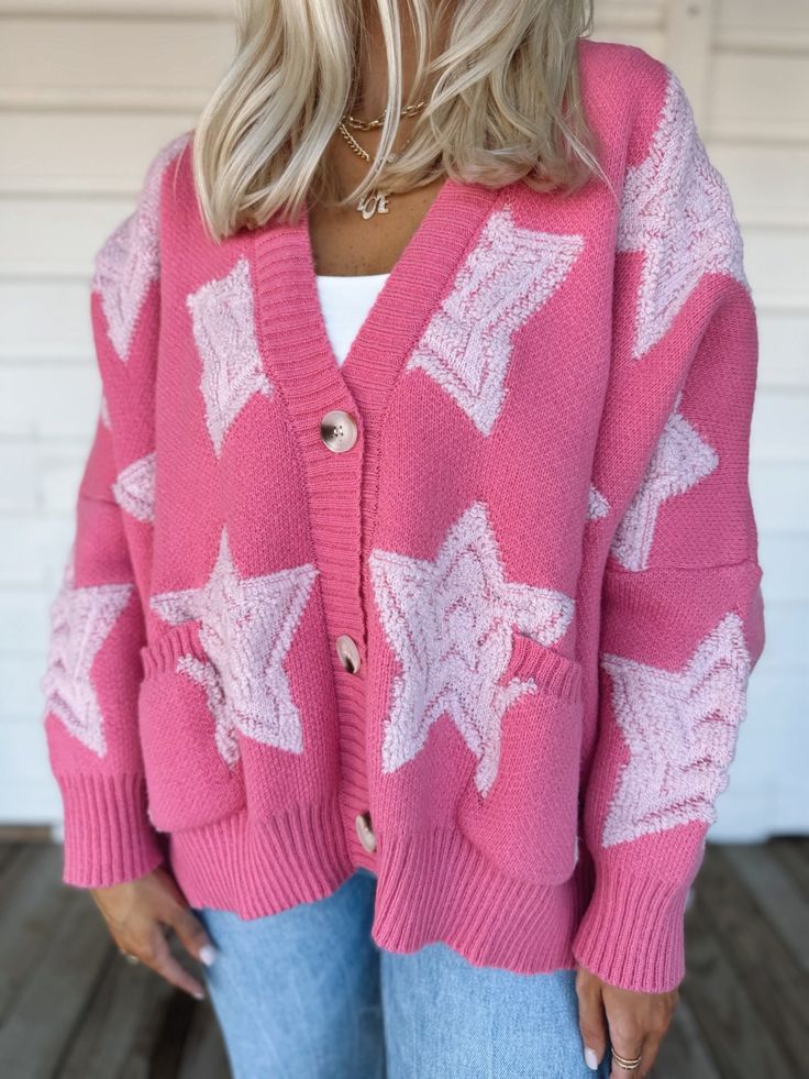 Adorable Hot pink cardigan with star detailing and buttons on front Model is 5'7" with a 28" waist, 34" bust, and 36" hips wearing a small Pink V-neck Cardigan For Loungewear, Oversized Trendy Pink Cardigan, Cute Pink V-neck Outerwear, Pink Cardigan For Fall Loungewear, Oversized Star Print Sweater, Pink Long Sleeve Loungewear Cardigan, Pink Long Sleeve Cardigan For Loungewear, Cute Winter Loungewear Cardigan, Pink V-neck Outerwear With Button Closure