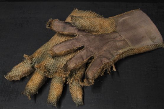 an old pair of gloves that have been worn