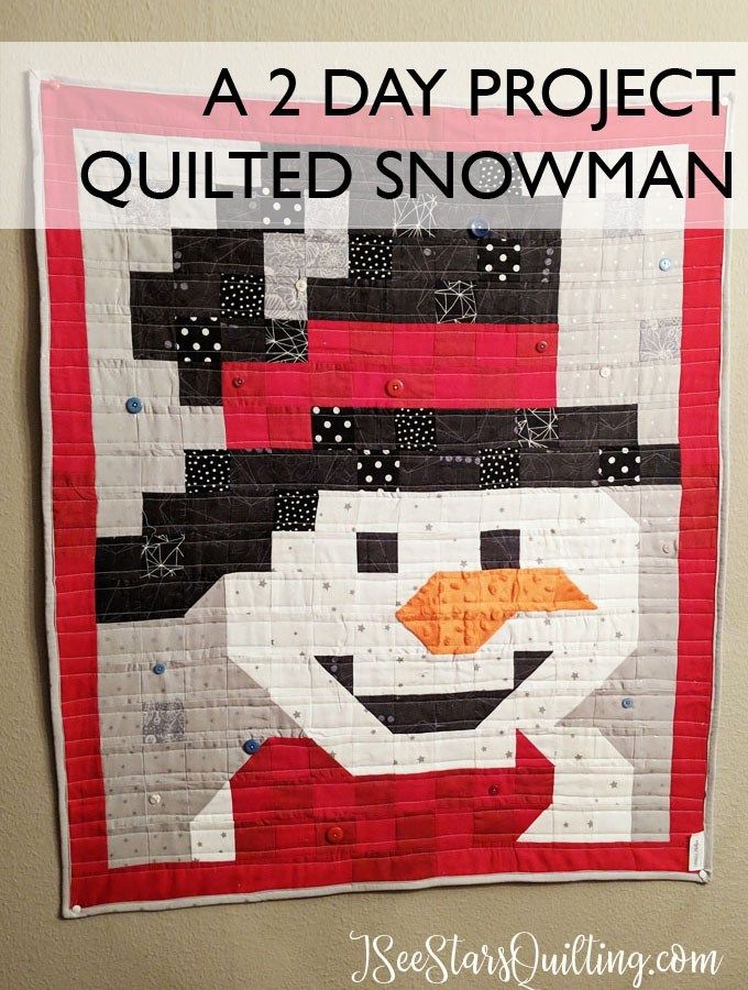 a quilted snowman hanging on the wall with text overlay reading a 2 day project quilted snowman