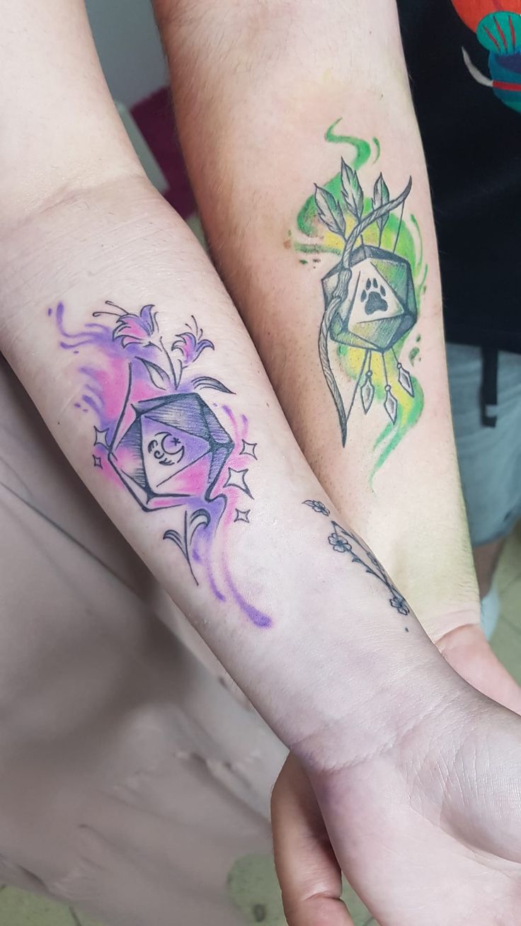 D&D inspired tattoos Dnd Couple Tattoos, Gaming Tatoos Ideas, D20 Tattoo Design, Dnd Inspired Tattoos, Dnd Dice Tattoo Design, Dnd Tattoo Sleeve, D&d Dice Tattoo, Dnd Tatoos Ideas, D20 Dice Tattoo