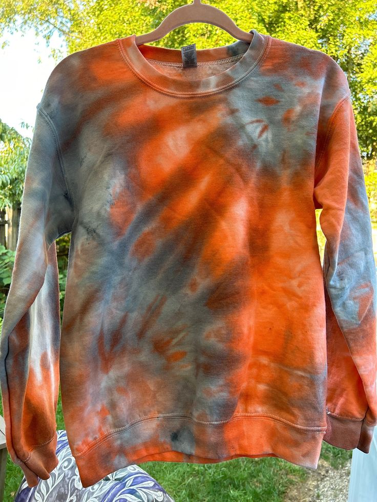 Ice Dyed Crew Neck Sweatshirt. Orange, silver Acid Wash Crew Top For Winter, Acid Wash Crew Neck Top For Fall, Casual Faded Crew Neck Sweatshirt, Casual Hand Dyed Tops For Winter, Fall Streetwear Bleached Tops, Acid Wash Sweatshirt For Fall, Casual Hand Dyed Sweatshirt, Casual Hand Dyed Sweatshirt For Winter, Casual Hand Dyed Sweatshirt For Fall