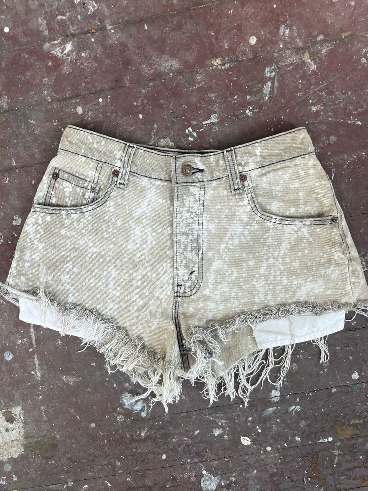 Bleached Levi's denim shorts, fits size 26/27 best. Found these denim Levi's shorts at a thrift store in high school and decided to try and give them a facelift. Tag says waist is a size 30, but these have shrunken a bit. These shorts are short, so they show a bit of booty.  If you have questions or would like exact measurements, just message me. All sales are final. Relaxed Fit Washed Jean Shorts, Washed Relaxed Fit Jean Shorts, Washed Cotton Jean Shorts, Cotton Washed Jean Shorts, Faded Cutoff Shorts With Relaxed Fit, Faded Relaxed Fit Cutoff Shorts, Vintage Distressed Shorts For Summer, Vintage Faded Cotton Shorts, High-waisted Washed Cotton Shorts